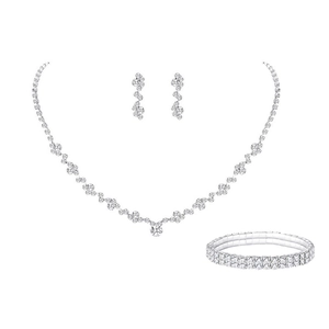 Macro detail of silver bridal jewelry set with sparkling rhinestones and zircon crystals