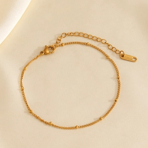 Bracelet de cheville minimaliste en acier inoxydable doré avec perles sur tissu en soie