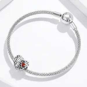 925 sterling silver heart charm bracelet with red zircon and ribcage pendant