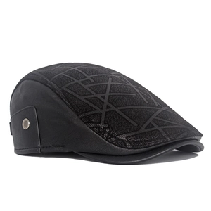 Detail of premium black faux leather duckbill cap with geometric fabric texture on top