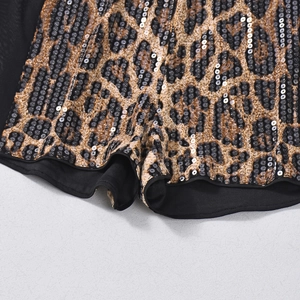 Close-up of leopard print sequins and mesh stitching on these trendy elastic shorts