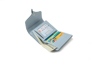 Inside look of light blue tri-fold PU leather wallet with card slots and cash compartment