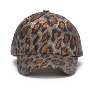 Golden leopard print baseball cap with metallic animal pattern and structured crown design