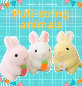 Detailed view of three plush pull-string animal toys in pink, white and yellow colors