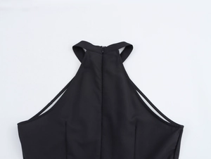 Close-up of halter back design with invisible zipper on vintage print maxi dress