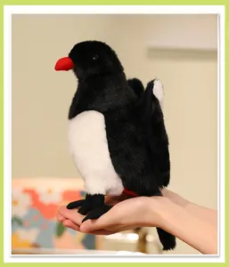 Detailed close-up showing soft plush texture and vivid colors of the magpie stuffed bird toy
