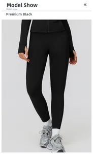 Detail view of the black yoga set featuring thermal high waist leggings and thumbhole sleeves