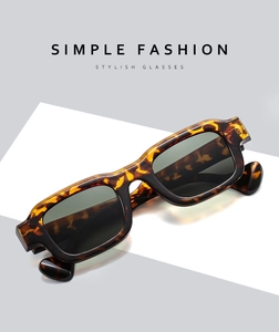 Close-up of tortoise shell pattern texture on vintage rectangle sunglasses frame