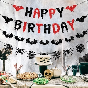 Halloween Happy Birthday banner with red glitter letters, black bats, and spider decorations