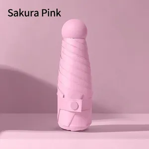 Mini sakura pink ultra-light capsule umbrella with 5-fold design and sleek matte finish