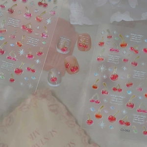 3D cherry nail art stickers with glitter finish and letter accents on transparent film