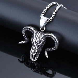 Detailed view of Viking ram skull pendant in vintage silver finish on black display stand