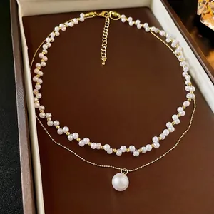 Collier double rang doré avec perles nacrées et grand pendentif perle de style français