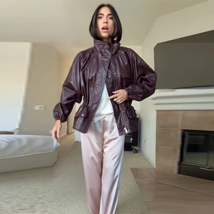 Women's burgundy faux leather utility jacket in oversized fit with drawstring waist