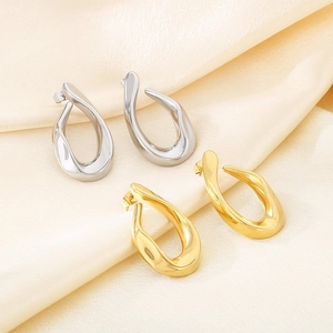 Minimalist irregular hollow water drop earrings in gold and silver polished metal finishes