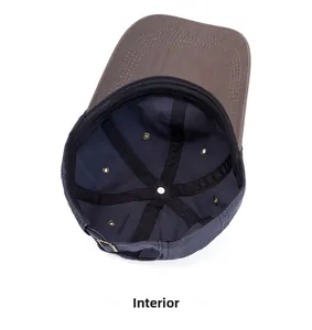 Detailed interior view of a baseball cap with metal eyelets and reinforced stitching