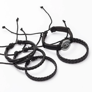 Adjustable black braided leather bracelet set with metallic Tai Chi Yin Yang charm