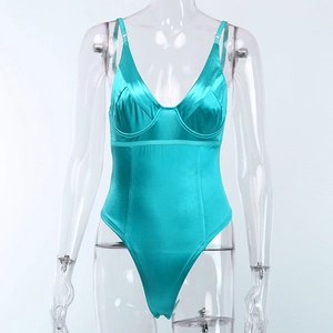 Detail of teal blue satin bodysuit showing glossy fabric texture and thin straps
