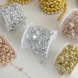 Golden and silver Christmas star bead chains for DIY festive tree and party decorations