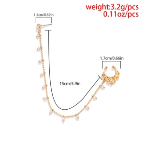 Detail view of pearl butterfly nose ring and ear stud chain with size specifications