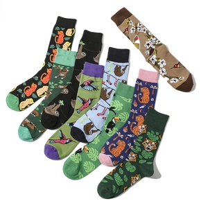 Detailed flat lay of cotton crew socks featuring diverse animal prints and vibrant patterns