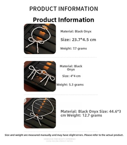 Detailed view of black gallstone bow jewelry set with precise size and weight measurements