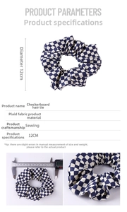 Detail view of a 12cm navy blue checkered scrunchie with size chart and fabric texture