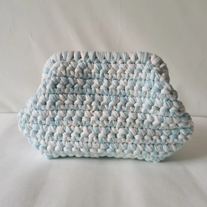 Handmade crochet cloud bag in blue and white fabric yarn with trapezoidal woven texture