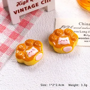 Miniature cat paw resin charm with pink face detail for DIY hair clip crafts