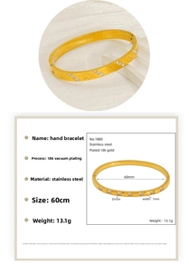 Detailed view showing 60mm inner diameter and 7mm width of the 18K gold clover bangle