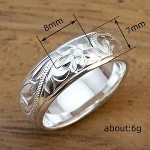 Classic silver floral ring with hibiscus relief design and dimension labels