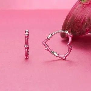 Pink heart-shaped 925 sterling silver hoop earrings with a vibrant glossy finish