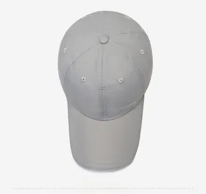 Top view of dark grey quick-dry baseball cap featuring a long brim and SPORTS side print