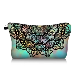Detail of colorful mandala print makeup bag with watercolor finish and black zipper