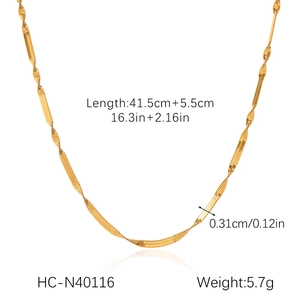 Detail view of a 0.31cm gold stainless steel snake chain with adjustable extender length