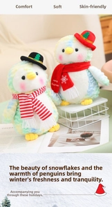 Detail of colorful tie-dye Christmas penguin plush with festive hat and red scarf