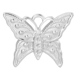 Macro view of butterfly pendant featuring silver texture and sparkling crystals