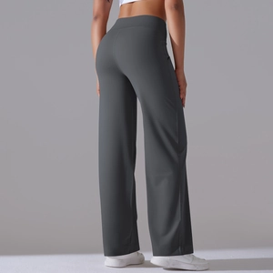 Detail view of charcoal grey high-waisted wide-leg yoga pants showing back fit and texture