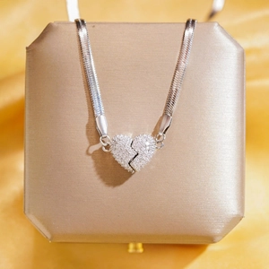 Luxe crystal paved magnetic heart pendant necklace with flat snake chain on gift box