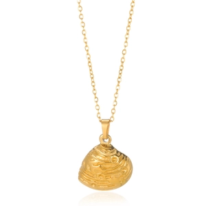 Detailed macro view of a gold-plated seashell pendant with textured wavy ocean patterns