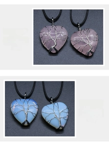 Detailed view of handmade rose quartz and opal tree of life heart pendant with dimensions