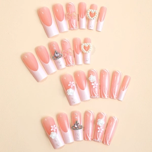 French tip press-on nails set with pink bows, pearls, and rhinestones, 24 pieces pack