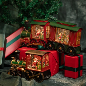 Christmas train snow globe music box with Santa and tree inside for holiday decor