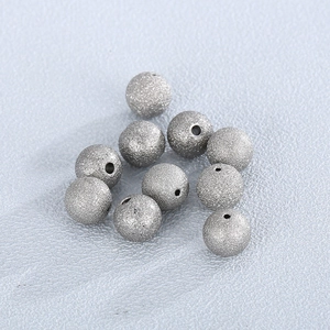 Frosted silver stainless steel beads for DIY jewelry making with matte finish texture