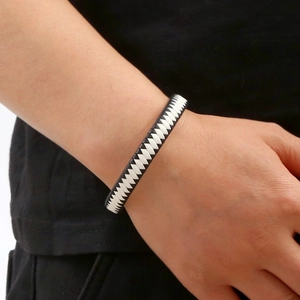 Men's minimalist black and white braided leather bracelet with stainless magnetic clasp