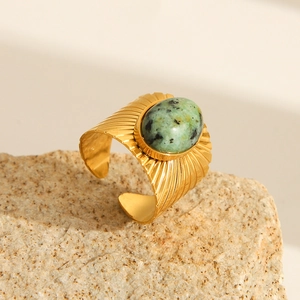 French vintage gold-textured open ring featuring an oval African turquoise on natural stone