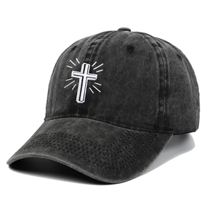 Distressed washed cotton baseball cap featuring white cross embroidery on a dark grey fabric