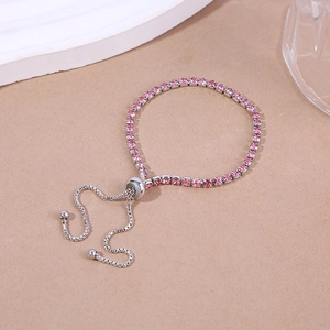 Detail view of 2.5mm pink cubic zirconia bracelet with adjustable silver-tone slider