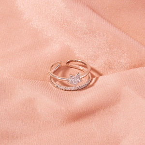 Macro shot of double-layer silver adjustable ring with starry cubic zirconia detail