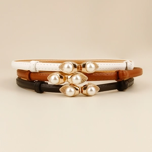 Three elegant slim women's belts in white, brown, and black with pearl gold buckles